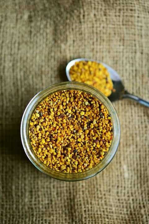A jar full of multi-colored bee pollen, HummingBee bee products